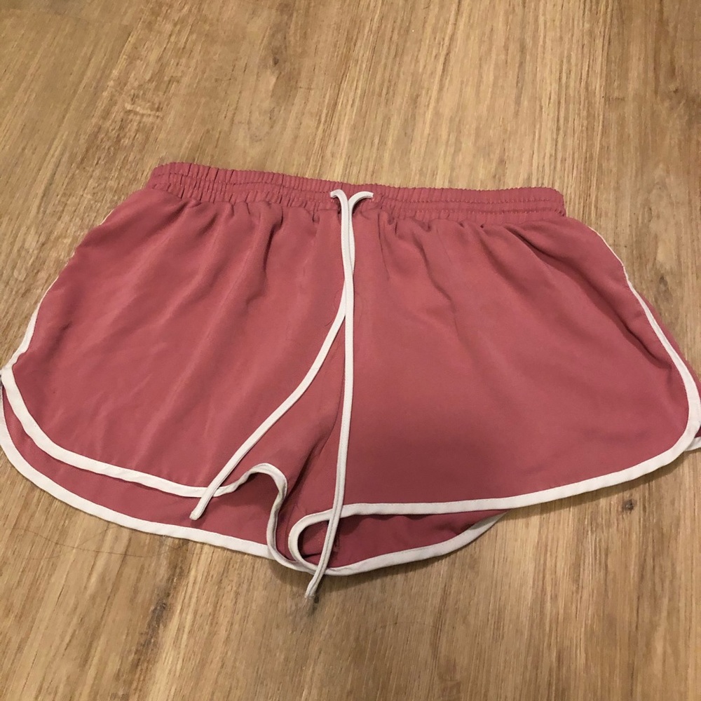 Pink shorts with white design